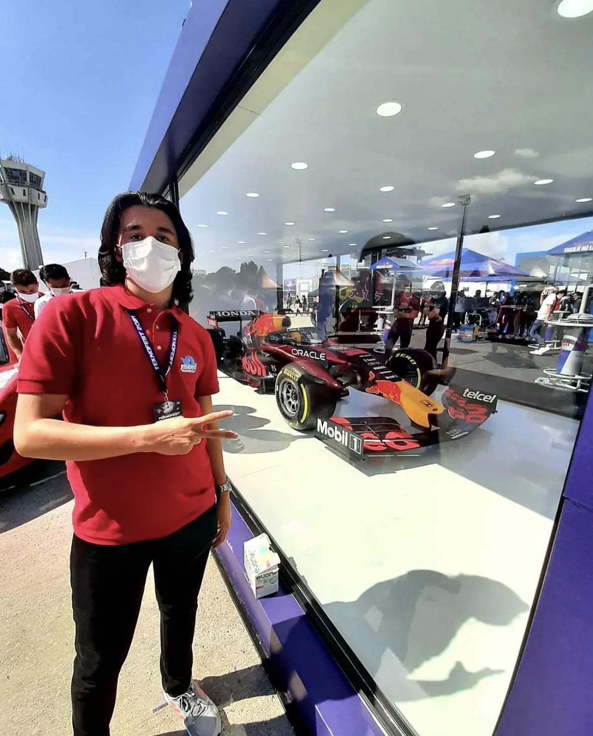Ibrahim beside a Formula One display at TEKNOFEST